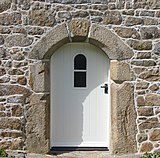 Арка дверей із замковим каменем. Сент-Оуен, острів Джерсі