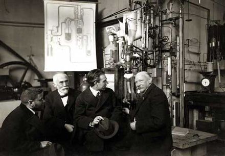 Heike Kamerlingh Onnes (right), the discoverer of superconductivity.  Paul Ehrenfest, Hendrik Lorentz, Niels Bohr stand to his left.