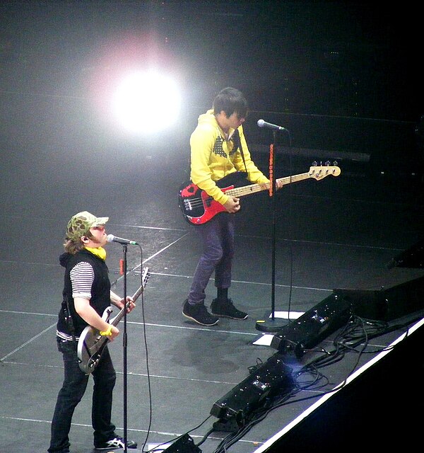 Patrick Stump and Pete Wentz performing in London on October 22, 2008. The two worked together at Stump's home during the early stages of the album's 