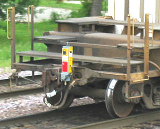 End-of-train device red light fixed to end of train used in signalling to confirm that a train has left a block section