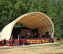 photograph of a band playing at a folk festival in Ester, Alaska.