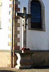 Cemetery cross and tombs