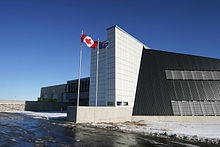 The front facade of this building is a transpired solar air heating system that heats the incoming ventilation air for the facility. GTAA - SolarWall.jpg