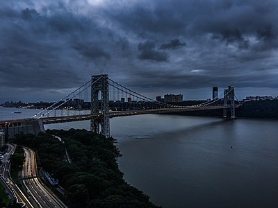 This is a photograph of the George Washington Bridge when a storm was passing over Washington Heights.