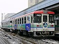 北海道新聞の広告車となったCR70-2 （2006年2月）