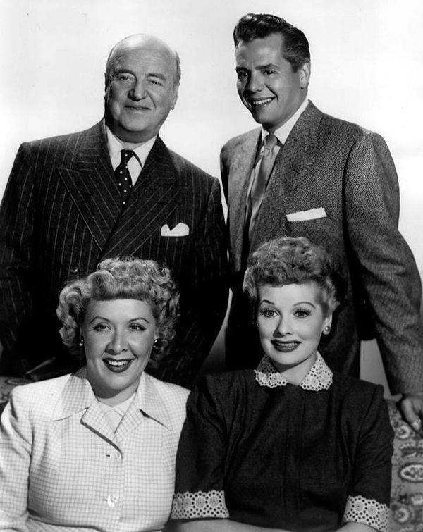 Cast members from left, standing: William Frawley, Desi Arnaz, seated: Vivian Vance and Lucille Ball