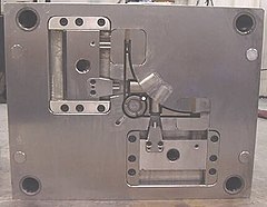 "B" side of die with side pull actuators.