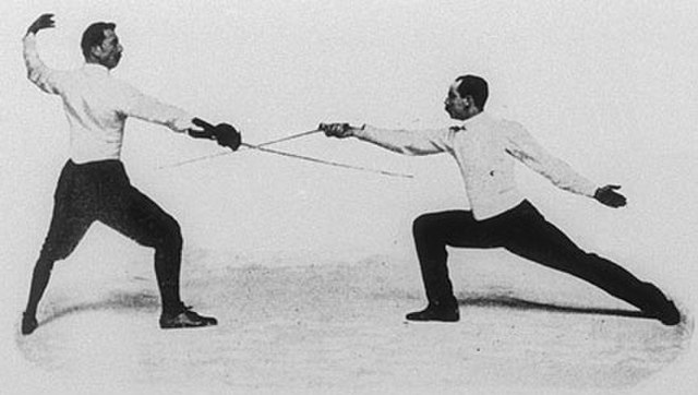 Italo Santelli (left) and Jean-Baptiste Mimiague exhibiting techniques of foil fencing at the 1900 Olympics