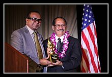 Rutnam received the main award at the Sri Lanka Foundation Awards, held on Sunday, November 16, 2014 at the Millennium Biltmore Hotel in Los Angeles. The award was presented by Sri Lanka Foundation President, Dr. Walter Jayasinghe for Rutnam's work with the Sri Lankan expatriate community in Southern California. Jayam Rutnam Award.JPG