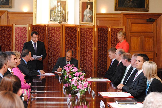 The Governor-General, Sir Jerry Mateparae, signs the warrants for new ministers of the Crown, January 2013