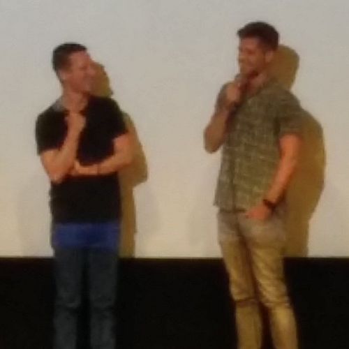 Director Justin Kelly with Charlie Carver, who plays Tyler