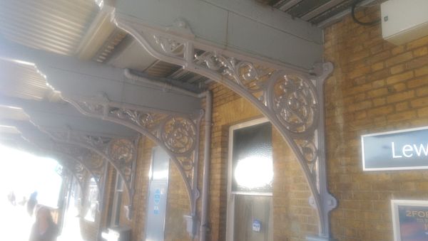 Elaborate cast iron brackets