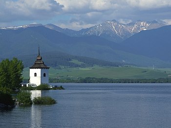 Liptovská Mara - church tower and water reservoir.jpg