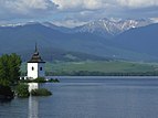 Liptovská Mara - church tower and water reservoir.jpg