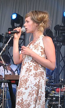 Performing with Broken Social Scene at Deer Lake Park in 2006.