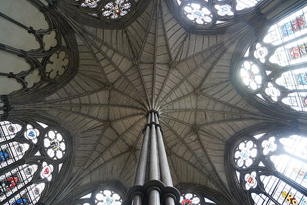 A ceiling shaped like an eight-pointed star, supported by a central pillar.