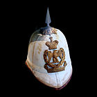 Spiked pith helmet of the Merina Kingdom, in pickelhaube style, marked with the name of Ranavalona III, the last queen of Madagascar.