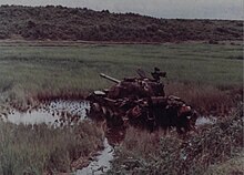 The wreckage of a People's Army of Vietnam T-54 tank, destroyed by Army of the Republic of Vietnam soldiers, 1972 NARA photo 111-CCV-133-CC81770.jpg