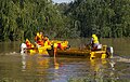 SES flood boats helping clear flood debris