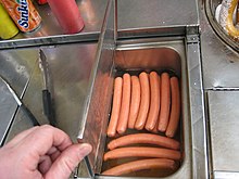 Hot dog cart hot dogs in heated water NYC Hotdog cart - hot dogs closeup.jpg#file