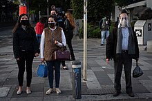 Office workers wearing masks in Mexico City streets Office workers COVID-19 Mexico City.jpg