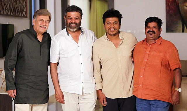 Nag (first from left) with actor Shiva Rajkumar (second from right) during a film shoot in 2018