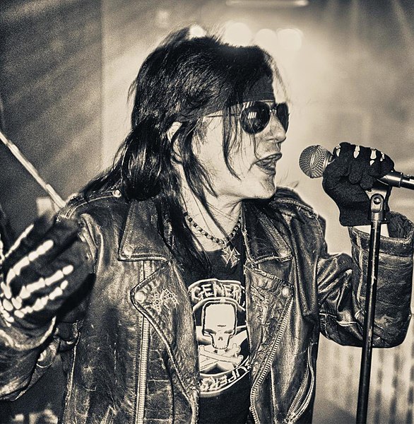 Lewis performing with L.A. Guns in 2010