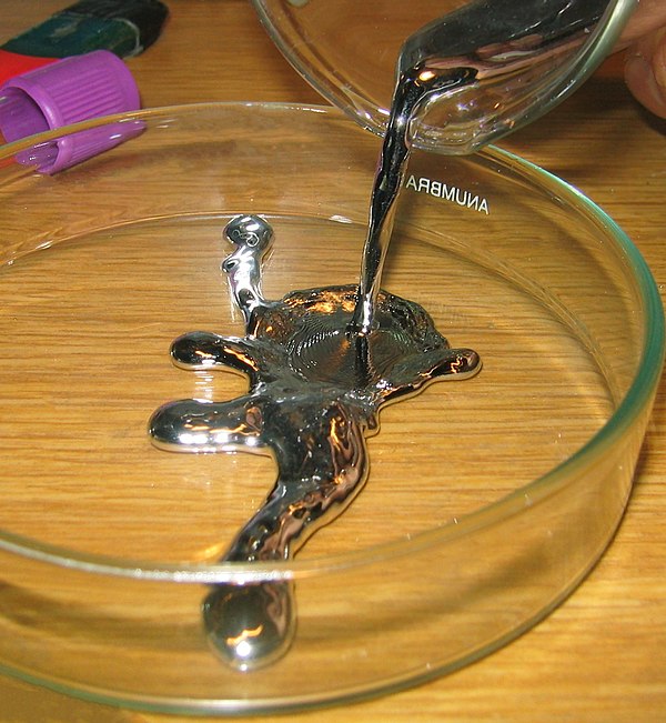 Liquid mercury. Its liquid state at standard conditions is the result of relativistic effects.