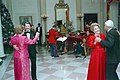 President Ronald Reagan, Margaret Thatcher, Nancy Reagan, and Denis Thatcher dancing in the Cross Hall.jpg
