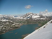 La face sud de la Pointe Clairy et le lac du Mont-Cenis voie de passage millénaire par ses deux cols