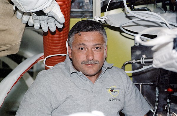 Fyodor Yurchikhin inside the Quest airlock during the STS-112 mission to the ISS.