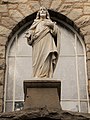 Sacred Heart statue above the main entrance.