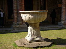 So-called "Pilatus' basin", in the middle of the so-called "Pilatus' Courtyard" of Santo Stefano in Bologna. This eighth-century Lombard sculpture bears the names of kings Liutprand and Ilprand, as well as of the bishop Barbatus. Santo Stefano a Bologna - Catino di Pilato.jpg