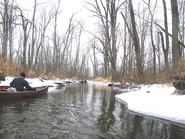 Winter canoeing and kayaking upon the Shiawassee River.