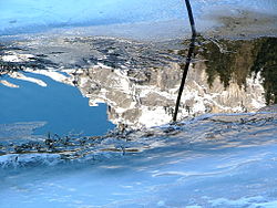 Mountain reflection on ice. Misurina (Auronzo) ITA 2004