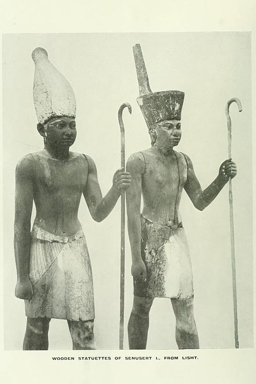 A couple of statuettes which represent a Middle Kingdom pharaoh as King of Upper Egypt (left, with the white crown) and King of Lower Egypt (right, wi