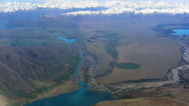Twizel (centre distance) from the air, alongside Lake Ruataniwha. Lake Benmore is seen in the foreground.