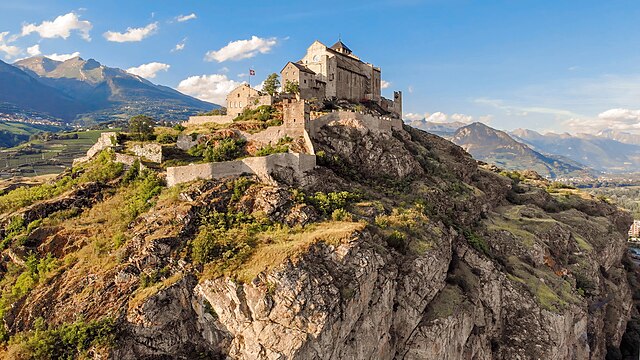 Valère Basilica dominating the Rhône Valley. By the 12th century, the bishops of Sion began building churches and castles in Sion to represent their p