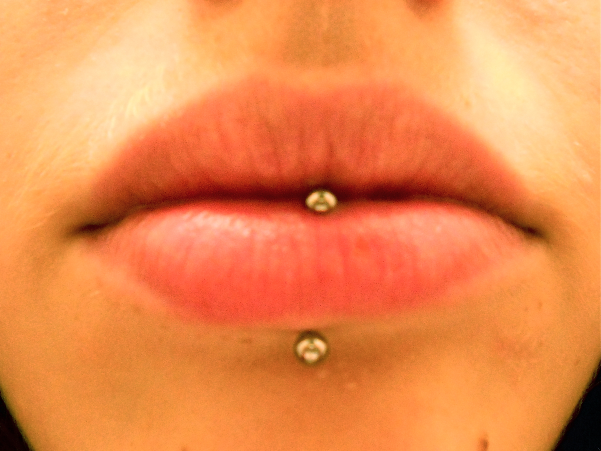 Piercing in the sales middle of your lip