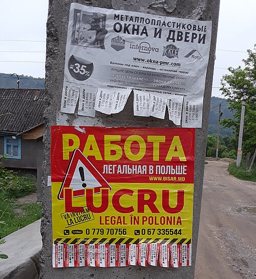 "Work in Poland legally" street advertisement in Transnistria