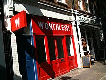 The exterior of 'Worthless' by artist Josef O'Connor (2009) in London. Worthless Exhibition Endell Street London.jpg