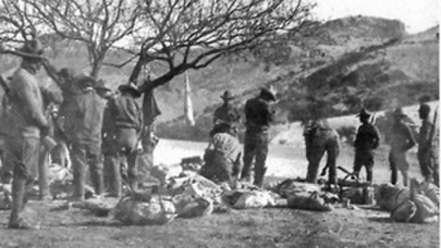 American troops watch over Yaqui prisoners following the Battle of Bear Valley in Arizona.