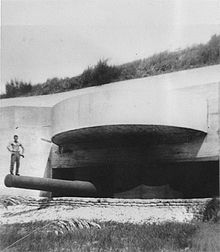 One of the twelve-inch guns at Battery Langdon, after the concrete casemate was completed in 1943. 12-inch-in-casemate.jpg