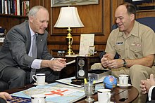 Royal Australian Navy Commodore Richard Menhinick (left), commandant of the Australian Command and Staff College, presents U.S. Naval War College (NWC) President Rear Adm. John Christenson, right, with an official gift containing sand from the Gallipoli battlefield.