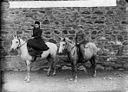 A girl and a boy riding ponies (Williams) NLW3363231.jpg