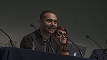 Bastani speaking at The World Transformed in 2017 Aaron Bastani, The World Transformed.jpg