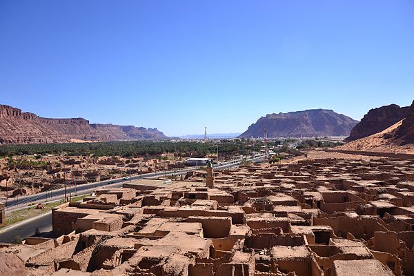 The city of Al-'Ula in 2012. The city's archaeological district is in the foreground, with the Hijaz Mountains in the background.