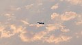 Alaska Airlines jet over Federal Way, WA having departed Seatac Airport.jpg