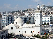 Mosque with a dome and square minaret