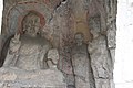 Ancient Buddhist Grottoes at Longmen- Northern Binyang Cave Main Buddha Statue with Bodhisattvas.jpg